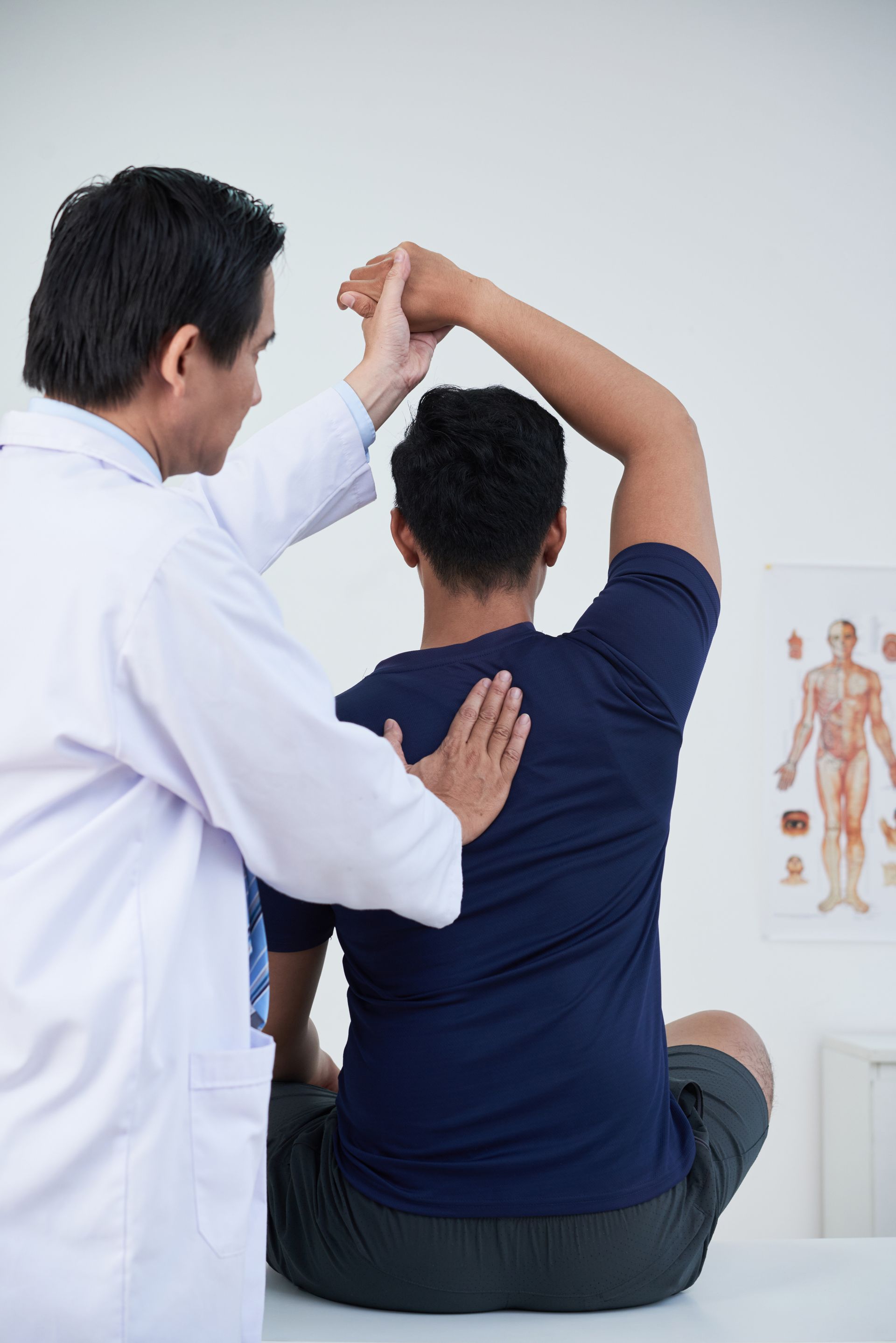 professional osteopath work with patient