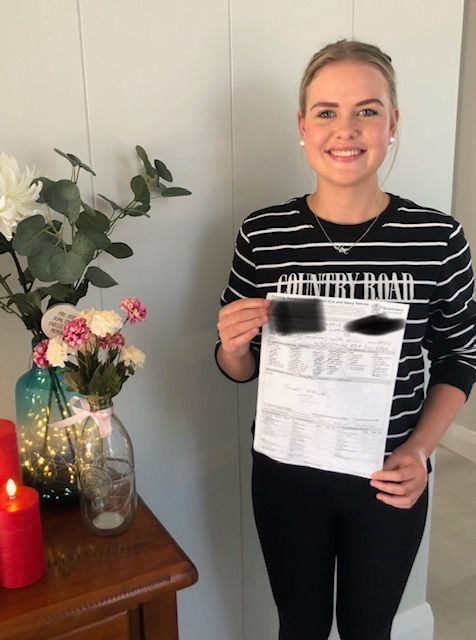 Student showing certificate — L2Drive Driving School in Warwick, QLD