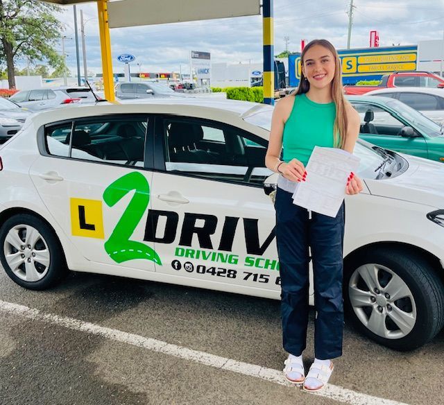 Student completing her driving lesson course — L2Drive Driving School in Warwick, QLD