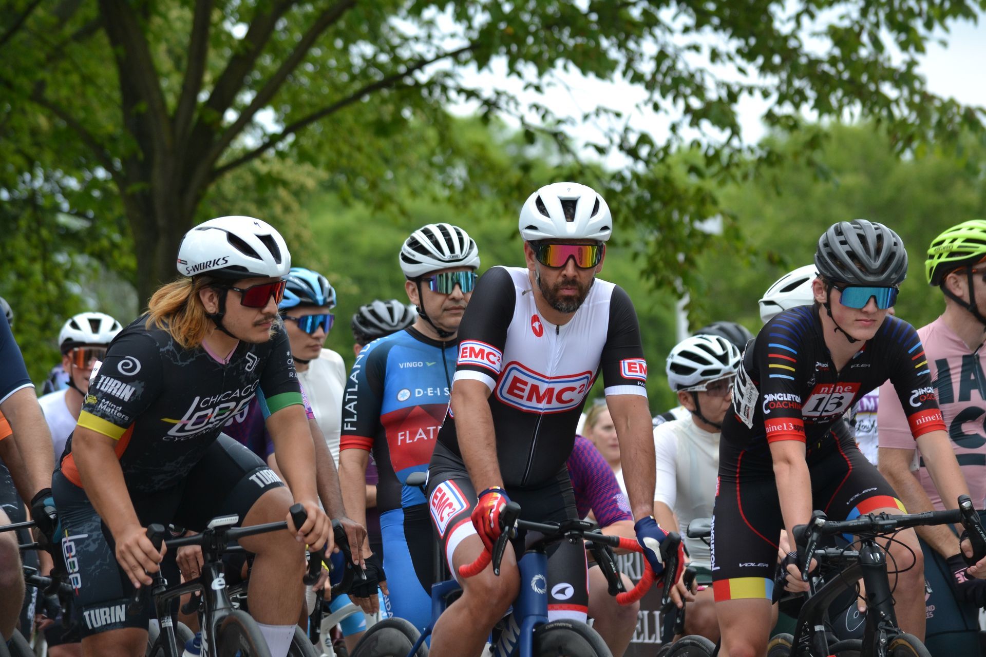 A group of people are riding bicycles in a race.