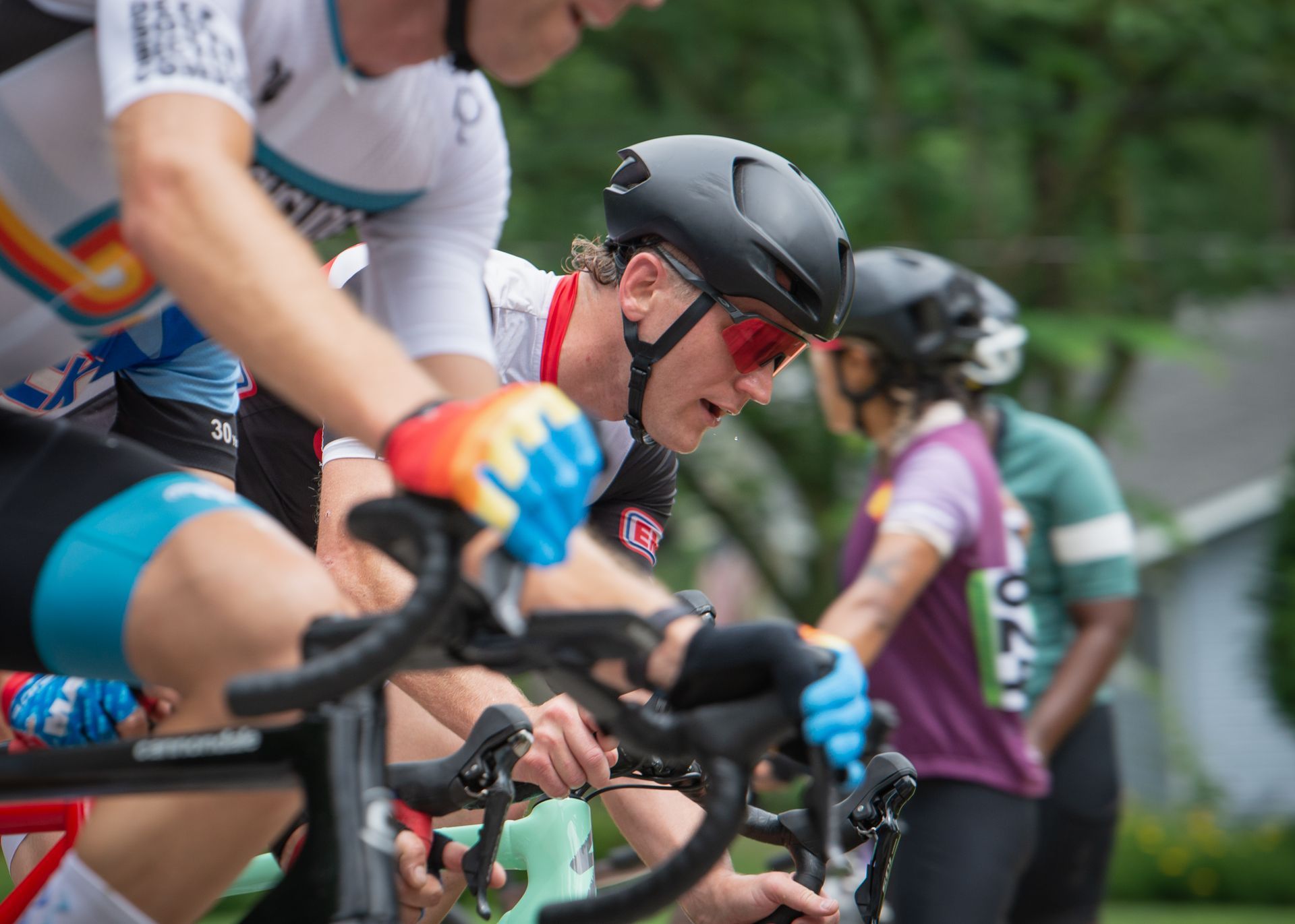 A group of people are riding bicycles in a race.