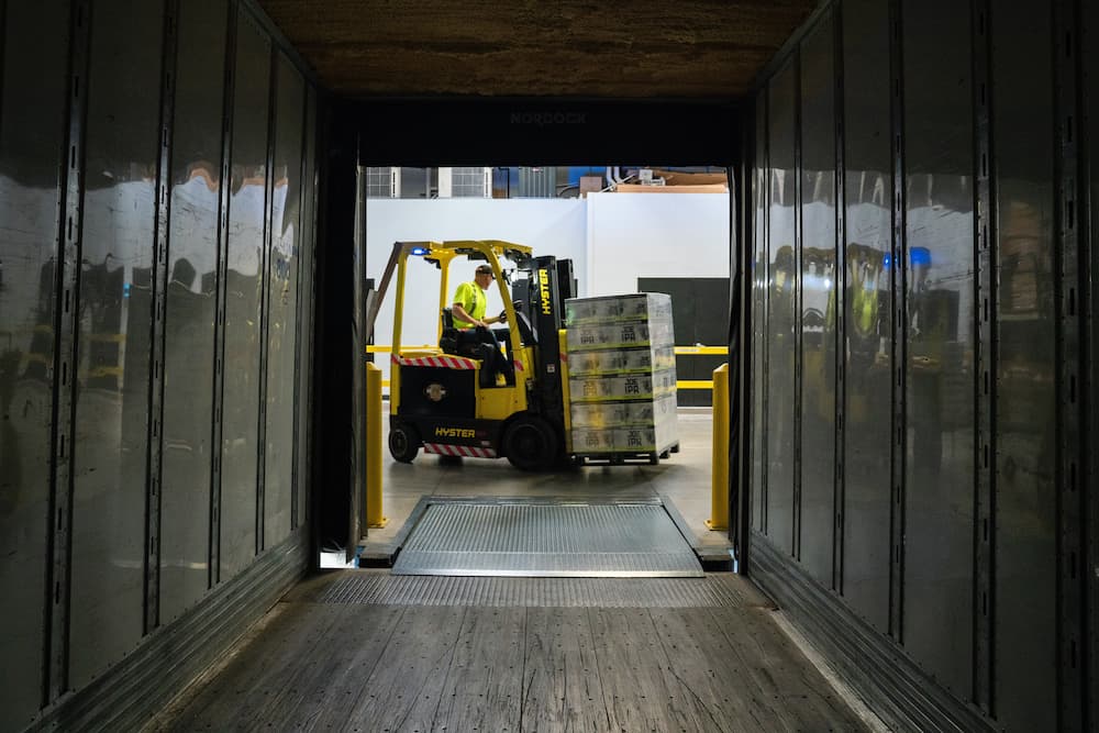 Man Operating the Forklift — Griffin Distributors in Mount St John, QLD