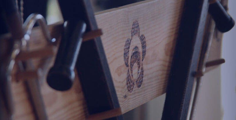 close up with company logo imprinted on wood
