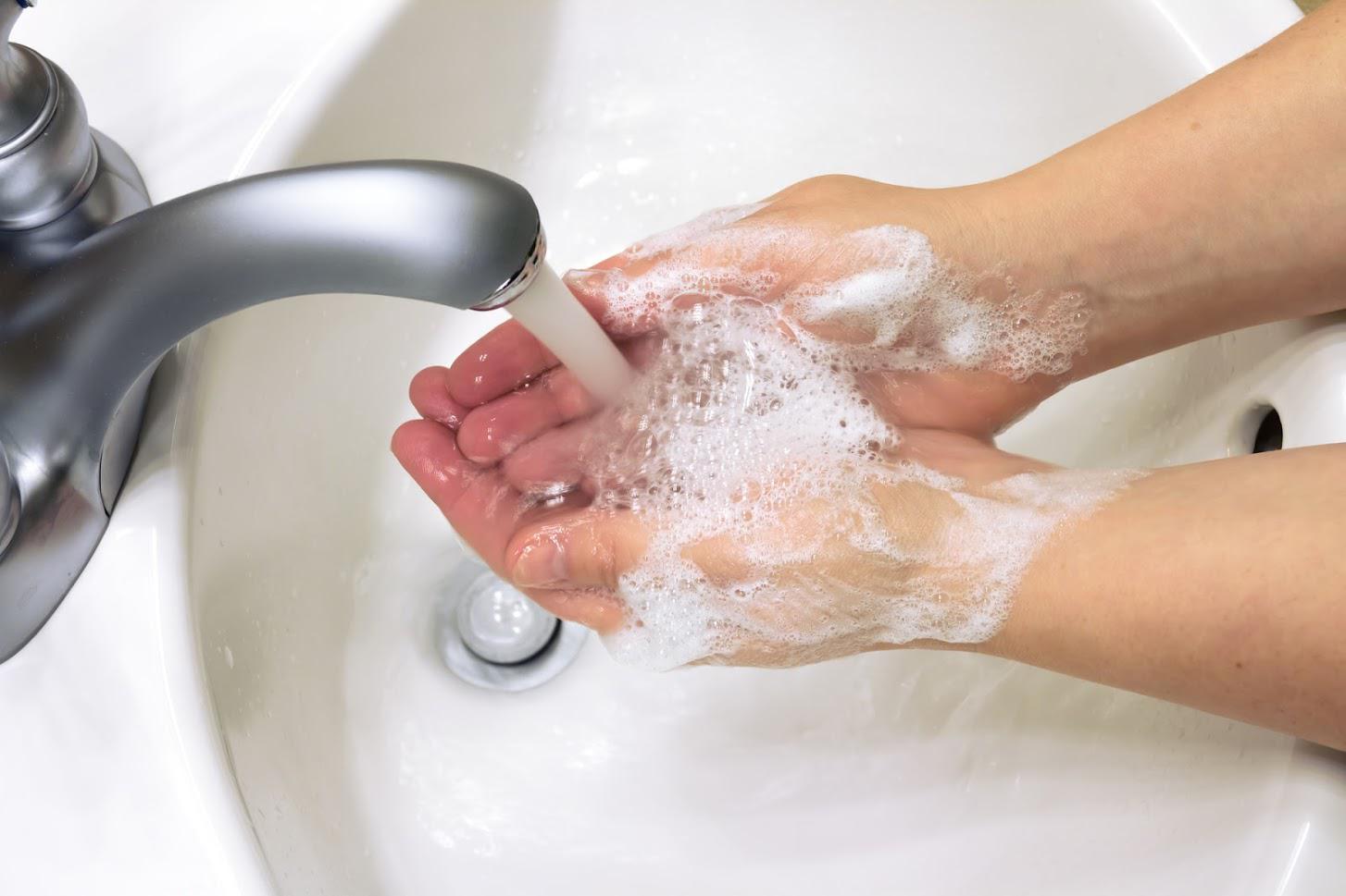 Washing Hands with Water and Soap — Dayton, OH — Complete Plumbing Washing Hands with Water and Soap — Dayton, OH — Complete Plumbing