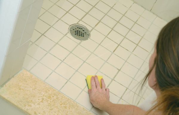 Girl Cleaning the Bathroom Floor — Dayton, OH — Complete Plumbing