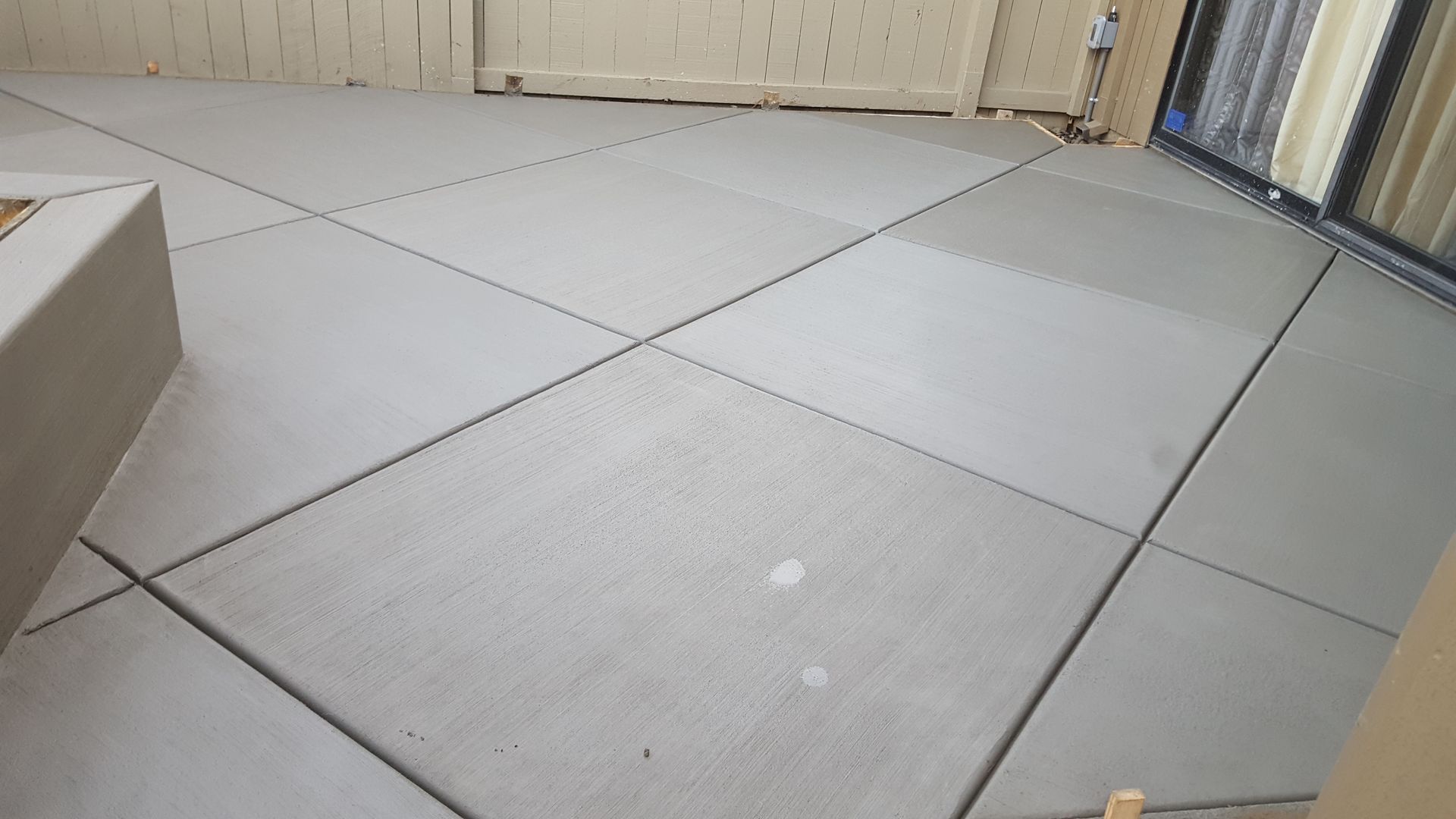 A close up of a tiled floor in a room.