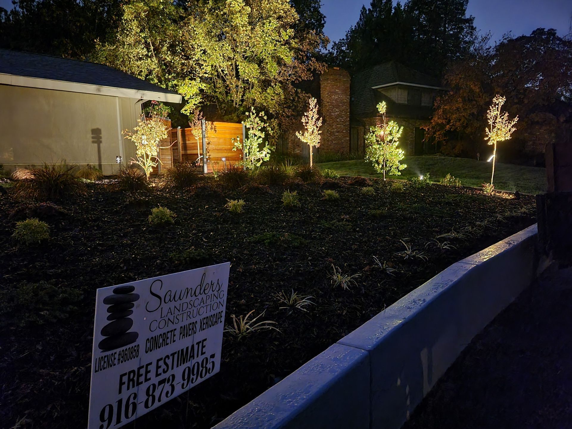 A sign in front of a house that says free estimate