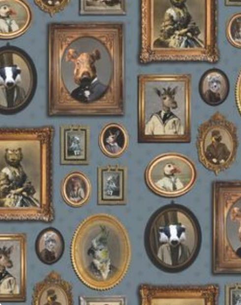 A wall with a lot of pictures of animals on it