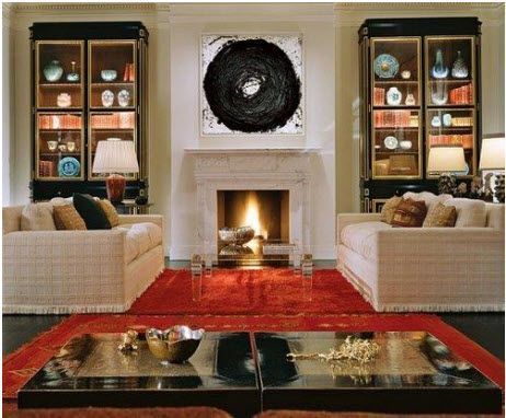 A living room with two couches and a fireplace