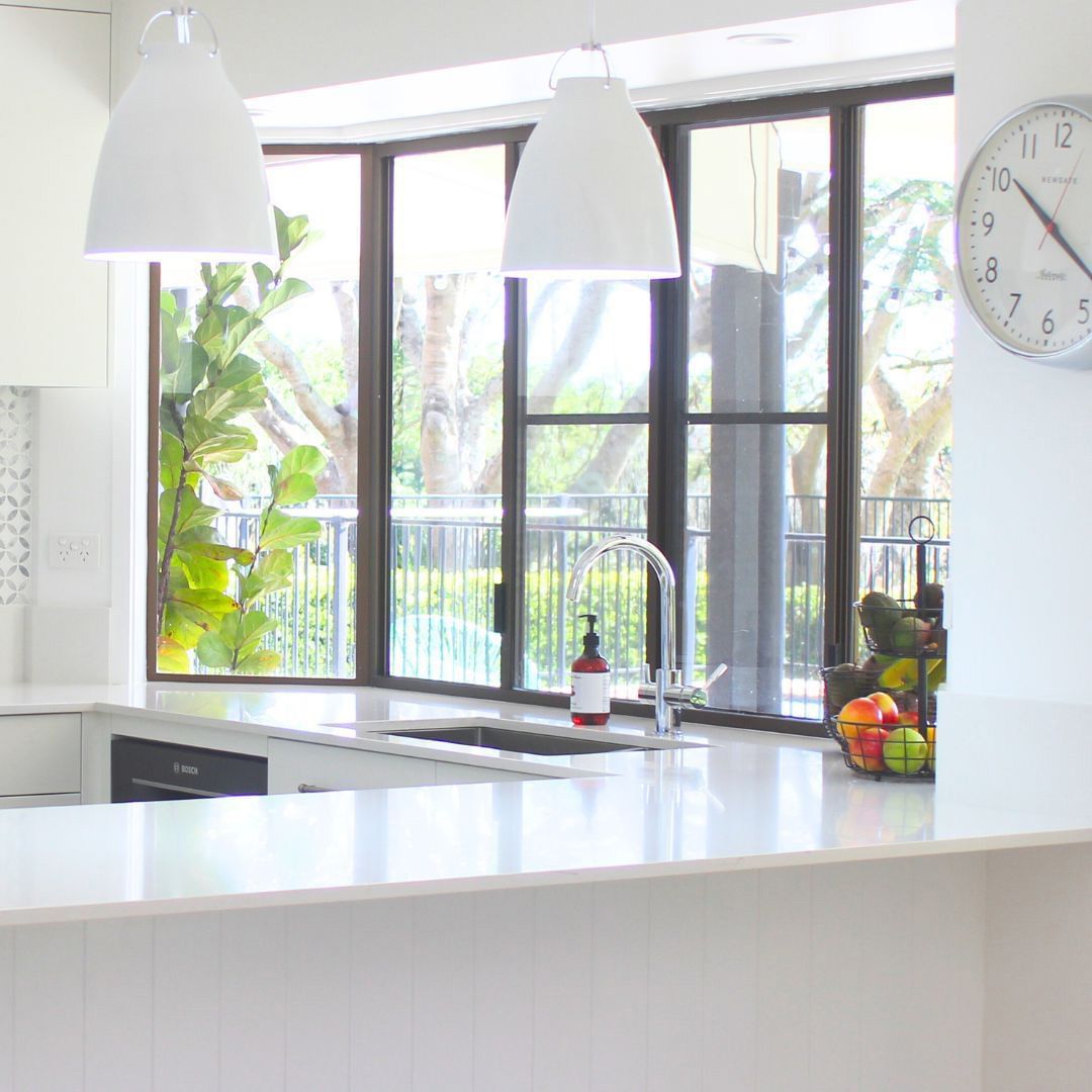 A Kitchen With A Sink And A Clock On The Wall — Ben Lynch Cabinetmaking in South Lismore, NSW