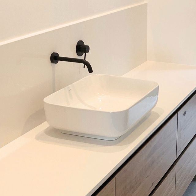 A Bathroom Sink With A Black Faucet On The Wall — Ben Lynch Cabinetmaking in South Lismore, NSW