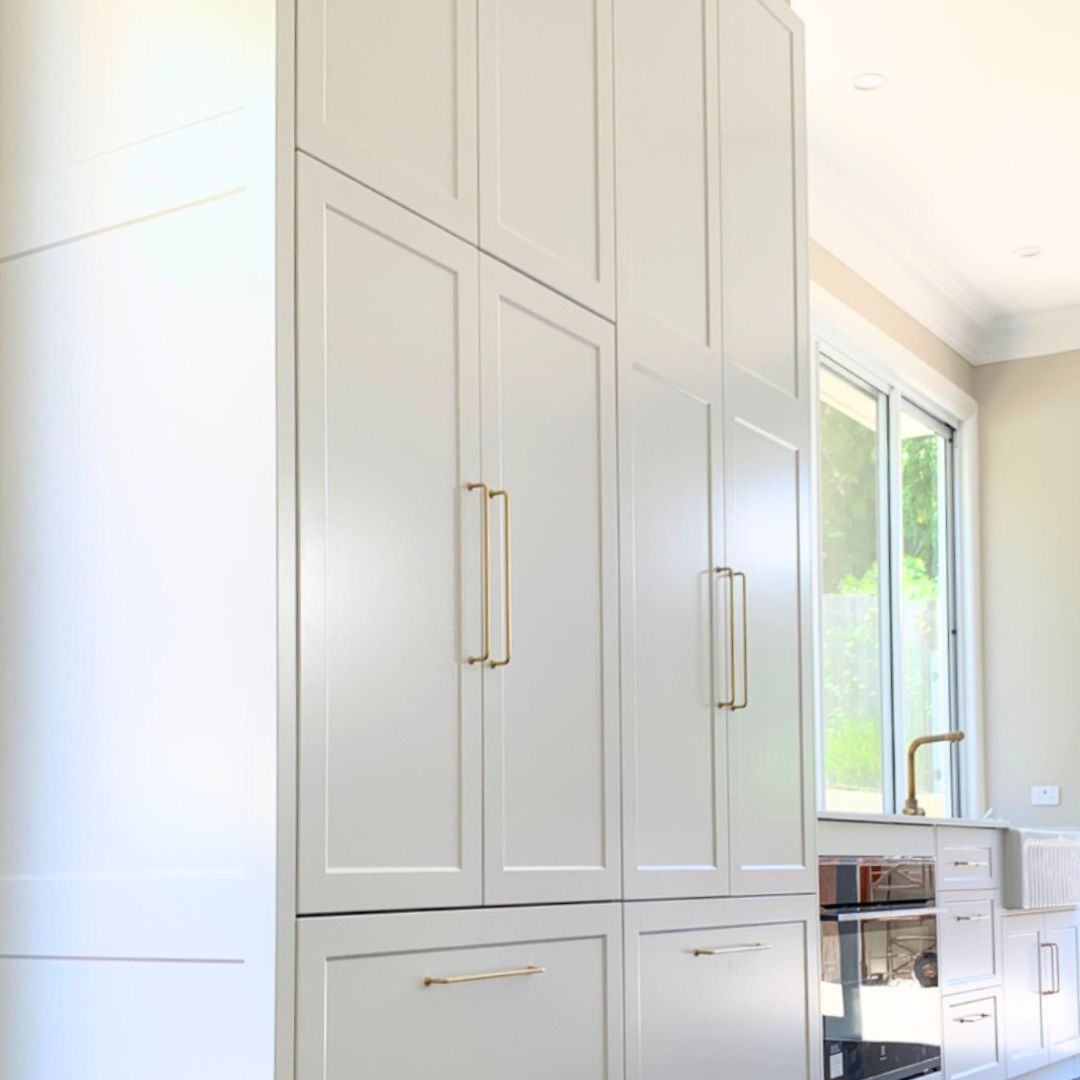 A Kitchen with White Cabinets and Gold Handles — Ben Lynch Cabinetmaking in South Lismore, NSW