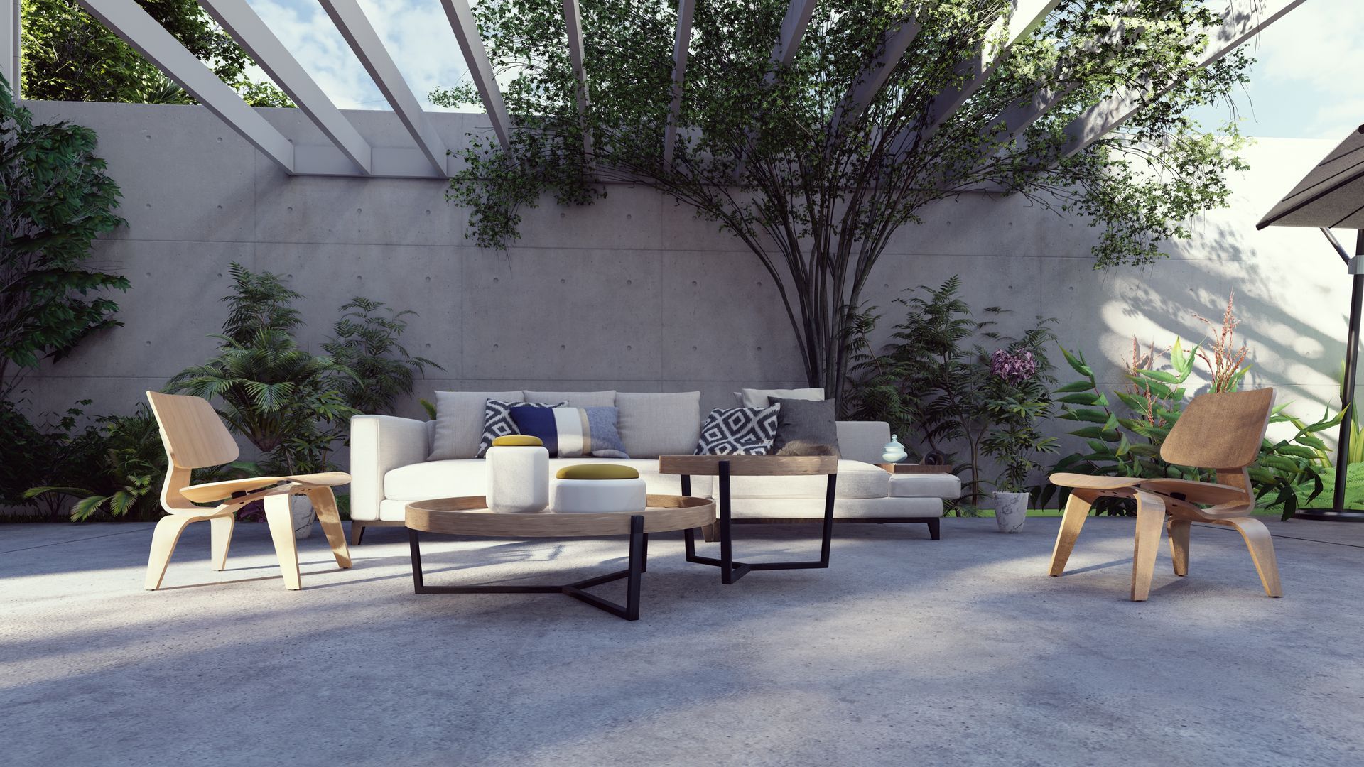 A living room with a couch , table , chairs and a tree.