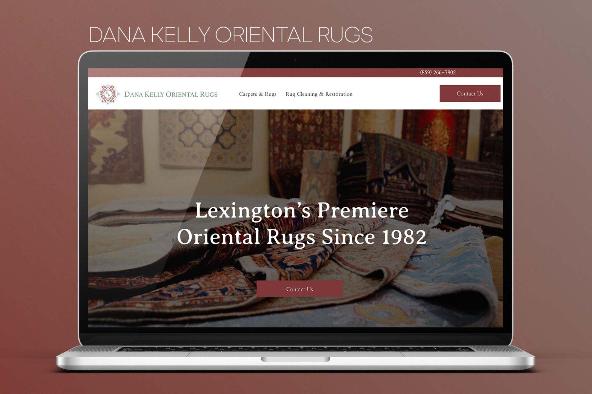 A laptop computer is open to a website for lexington 's premiere oriental rugs since 1982.