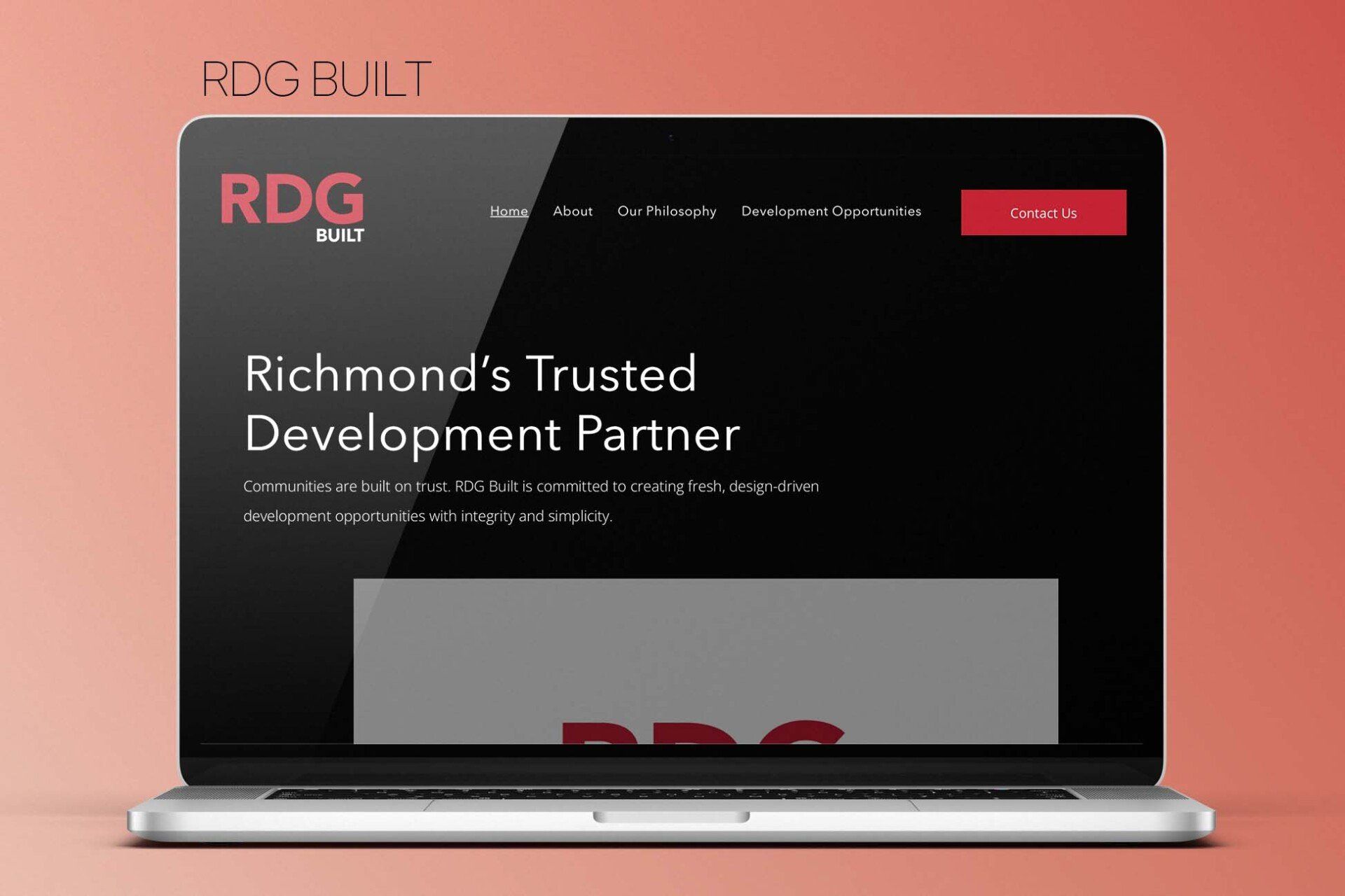 A laptop computer is open to a website for richmond 's trusted development partner.