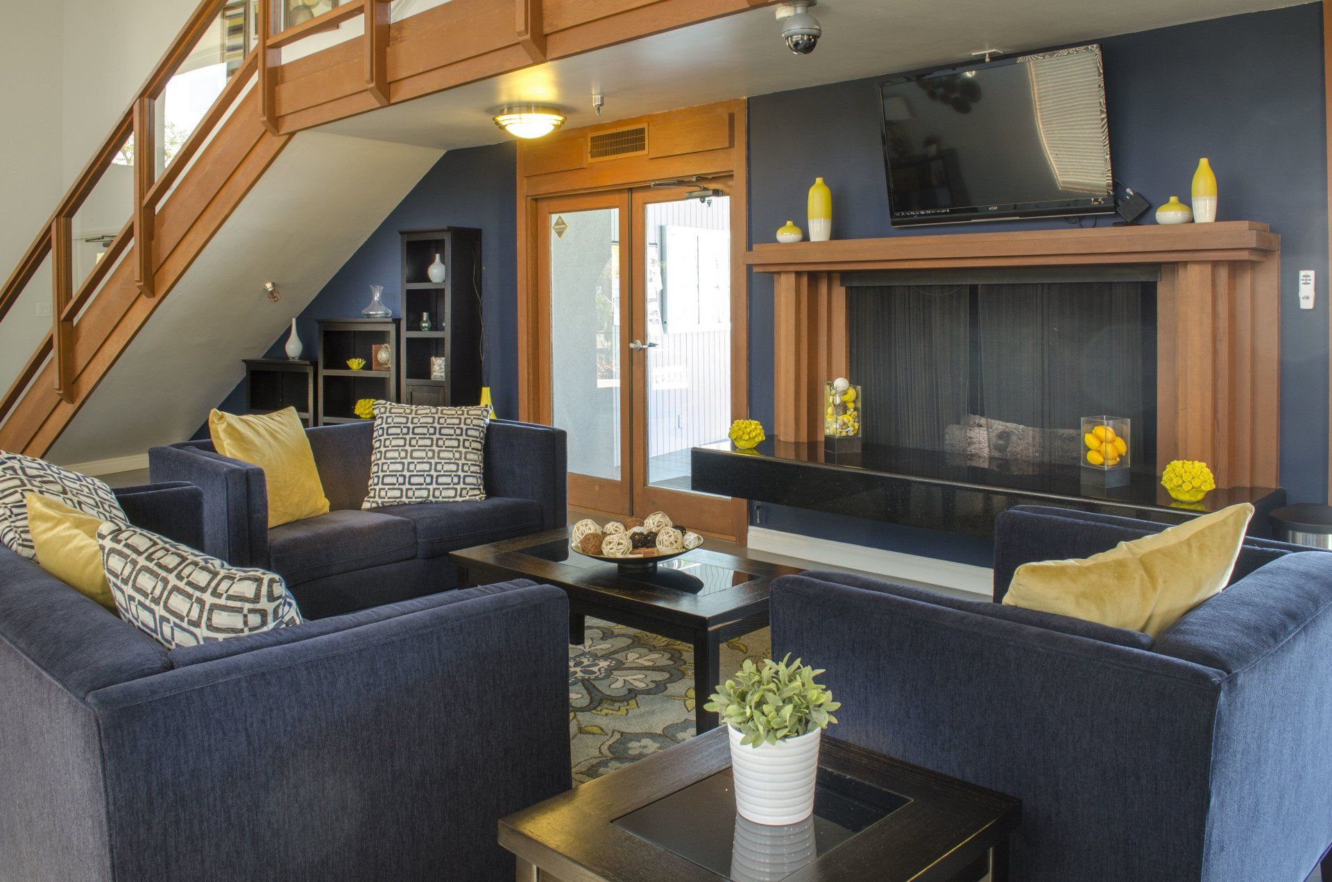 Community Room with Furniture and Fireplace in Bayside Village Mobile Home Park
