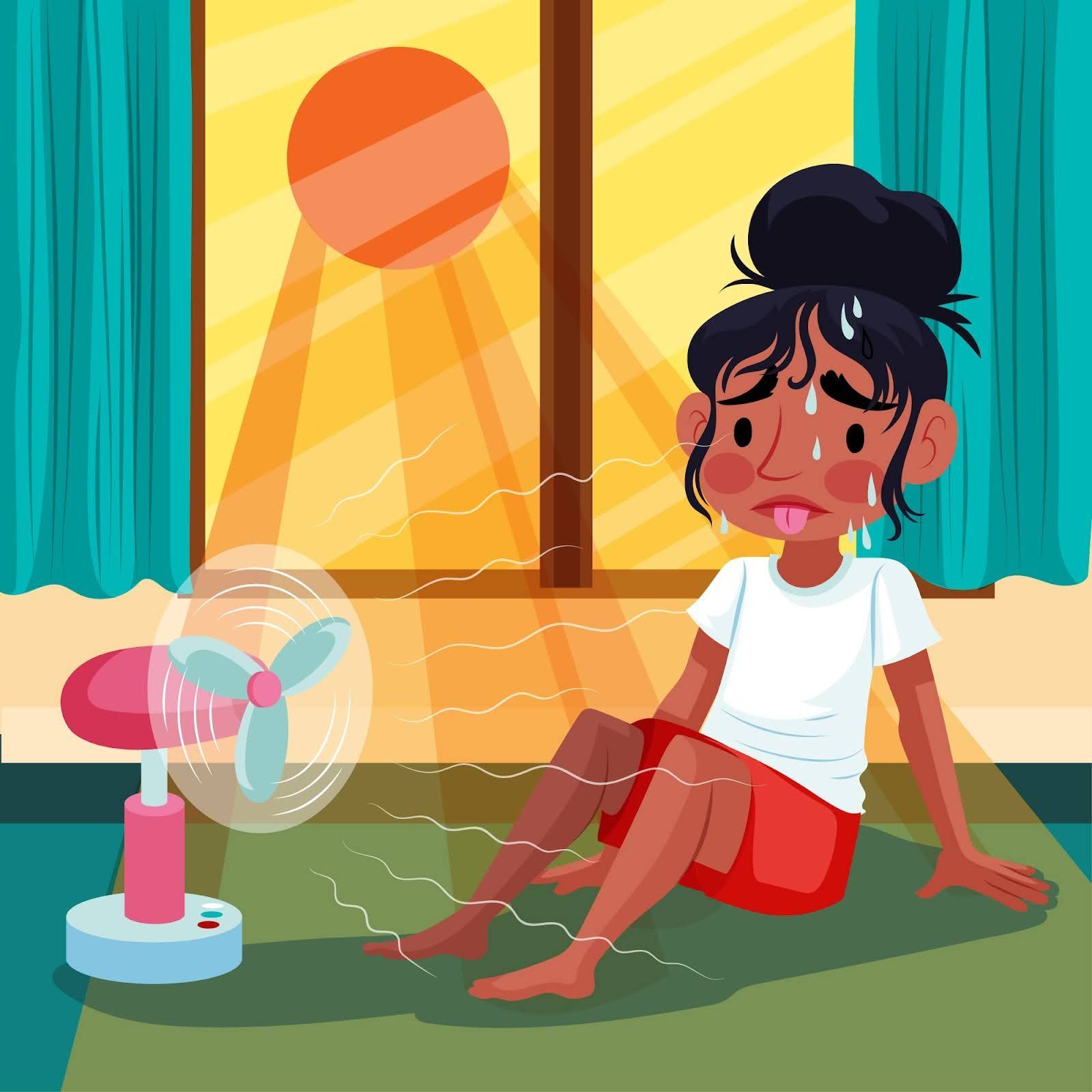 A woman is sitting on the floor in front of a fan.