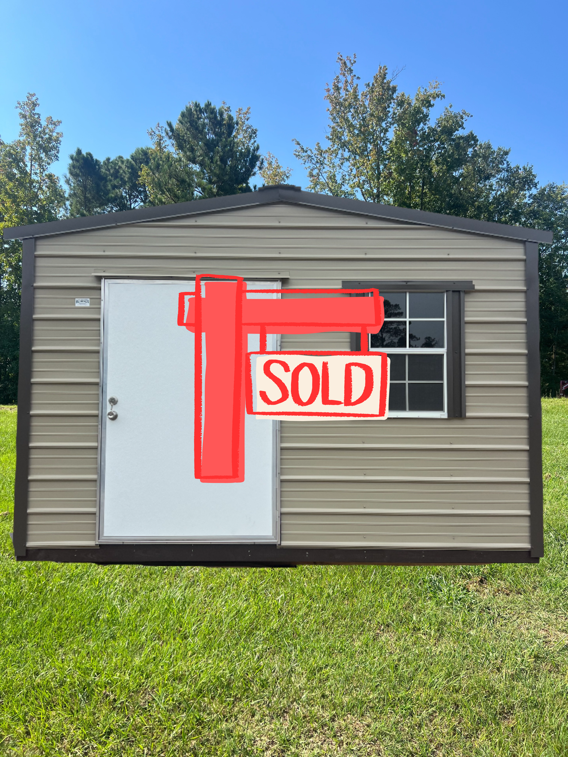 Tan metal storage shed with roll-up door, under a cloudy sky.