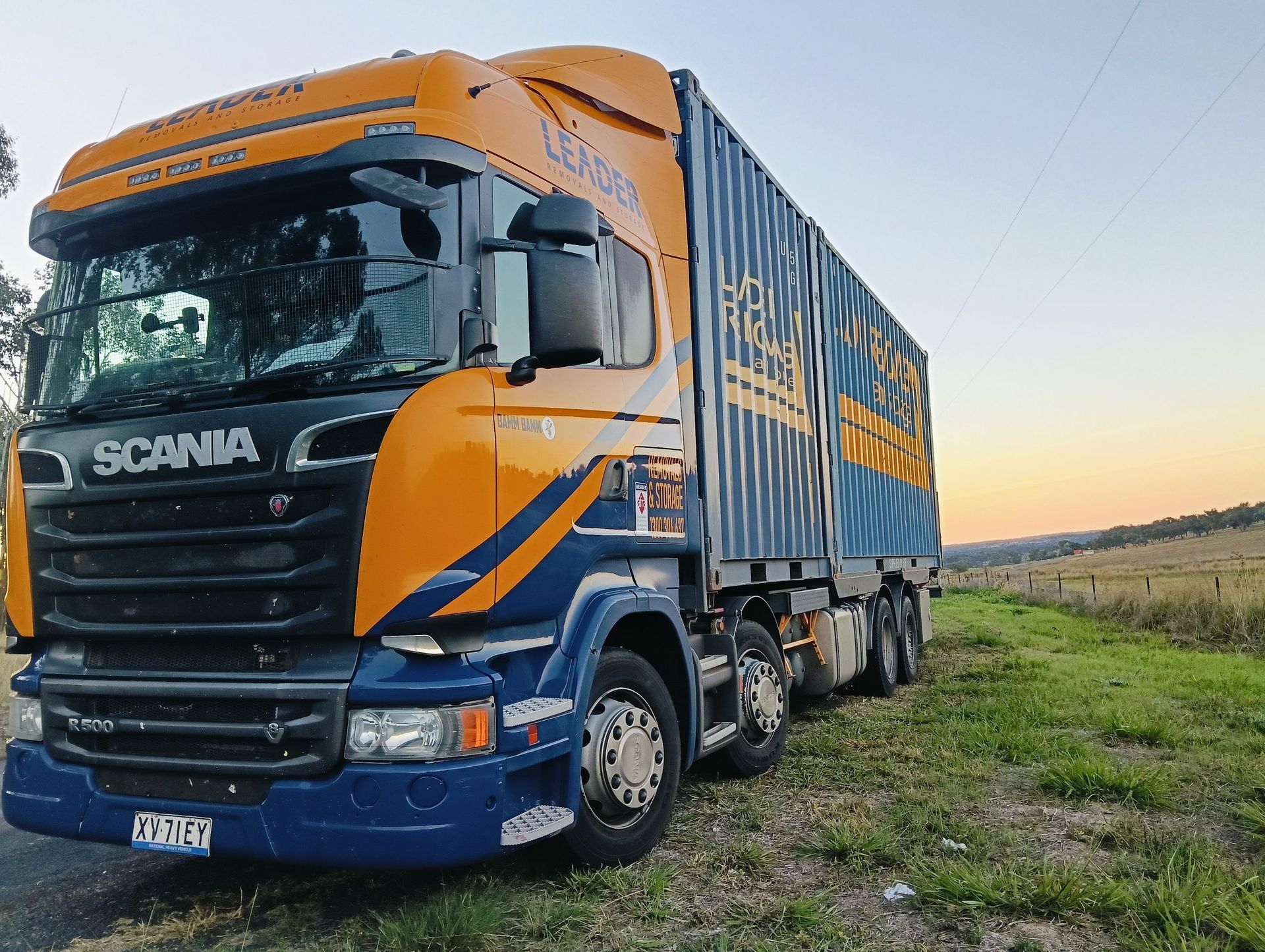 A Blue Truck with The Word Leader on It — Leader Removals & Storage in Mitchell, ACT