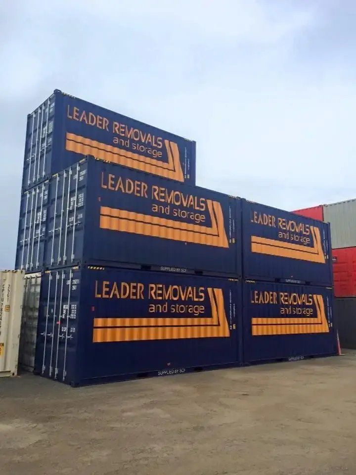 A Stack of Blue Shipping Containers — Leader Removals & Storage in Mitchell, ACT