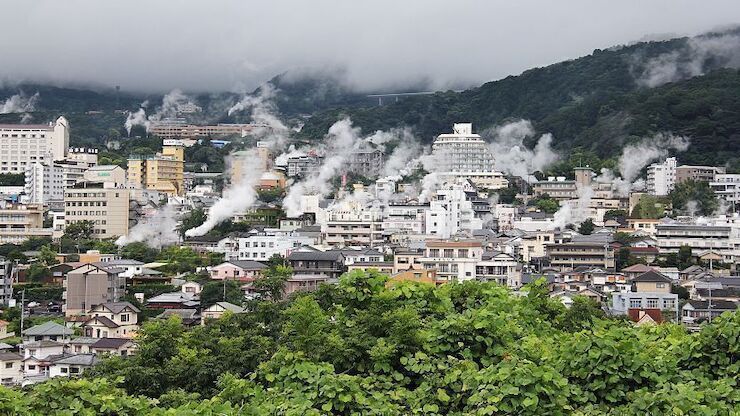 City of steam rising above buildings