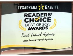 a plaque that says readers choice best of 2023 awards best travel agency