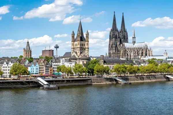 old church spires against the sky and river views