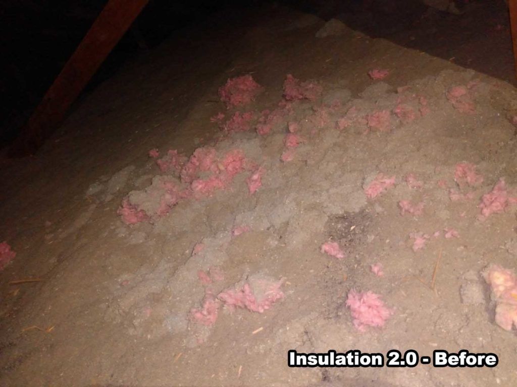 A picture of insulation 2.0 before taken in an attic