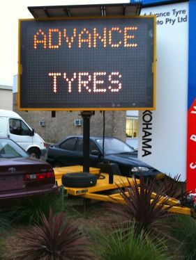 advance tyres signage