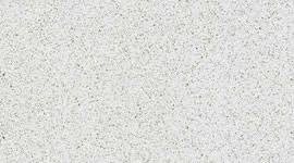 Un primo piano di una superficie bianca con una consistenza granulosa.