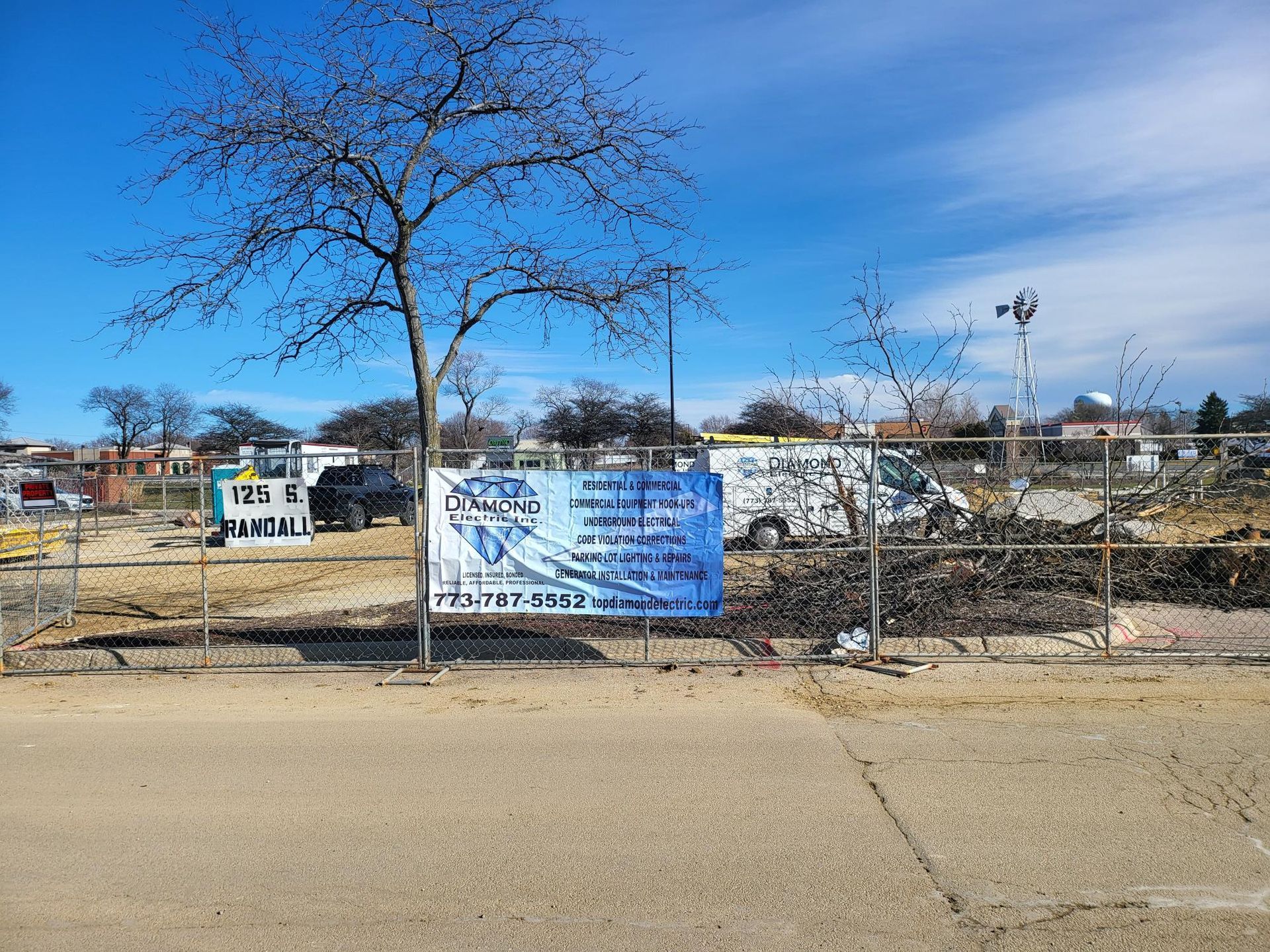 A fenced in area with a sign that says ' rp ' on it