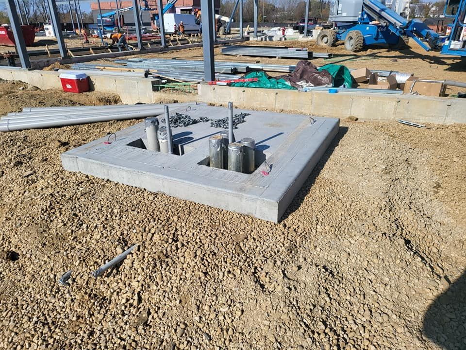 A construction site with a hole in the ground