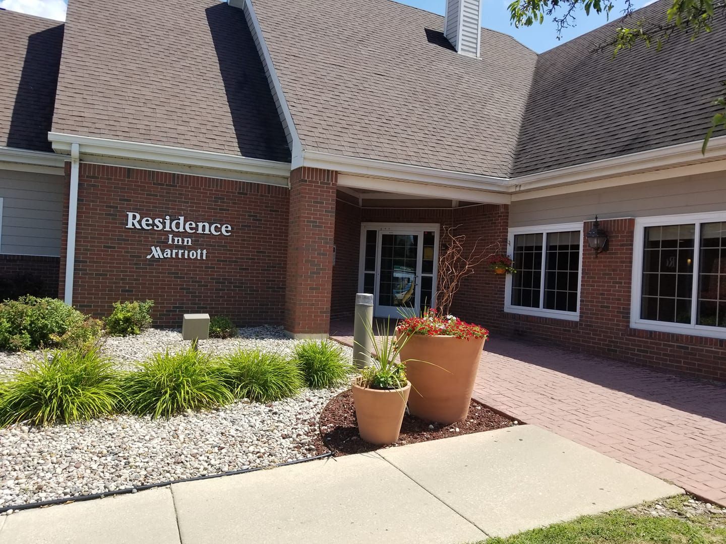 A large brick building with the word residence on it