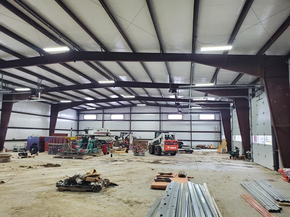 A large warehouse with a lot of machinery inside of it.