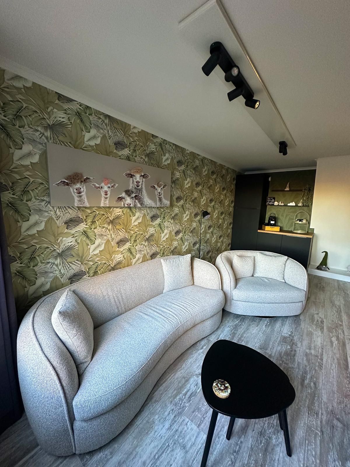 De woonkamer van Vakantiehuis Akkerzicht Oudesluis.