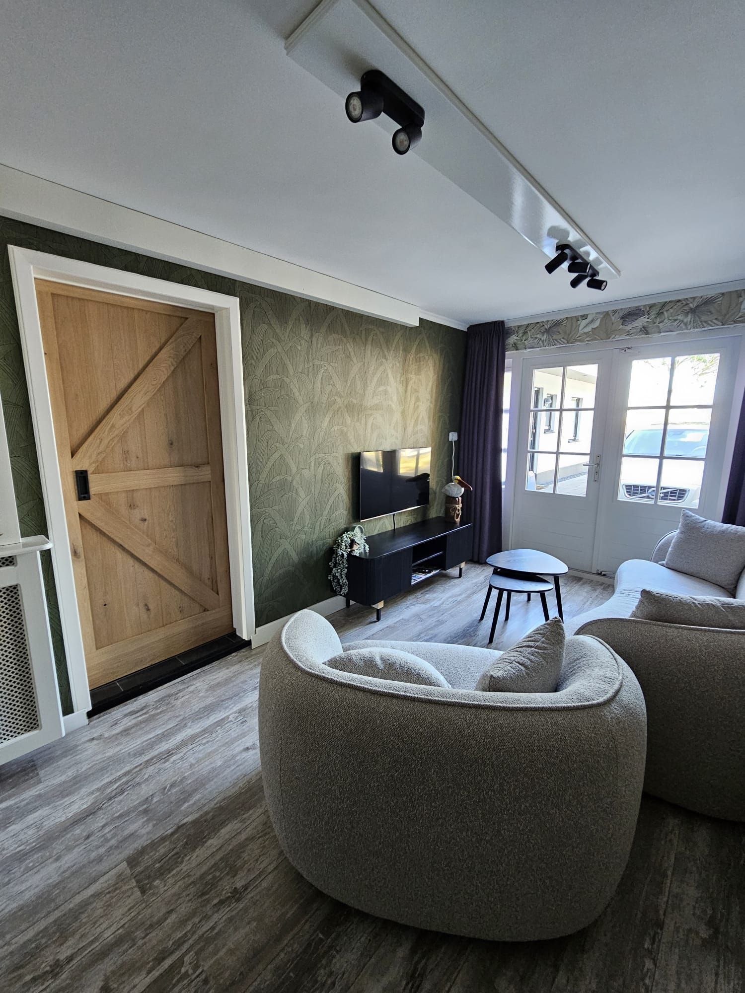 De woonkamer van Vakantiehuis Akkerzicht Oudesluis.