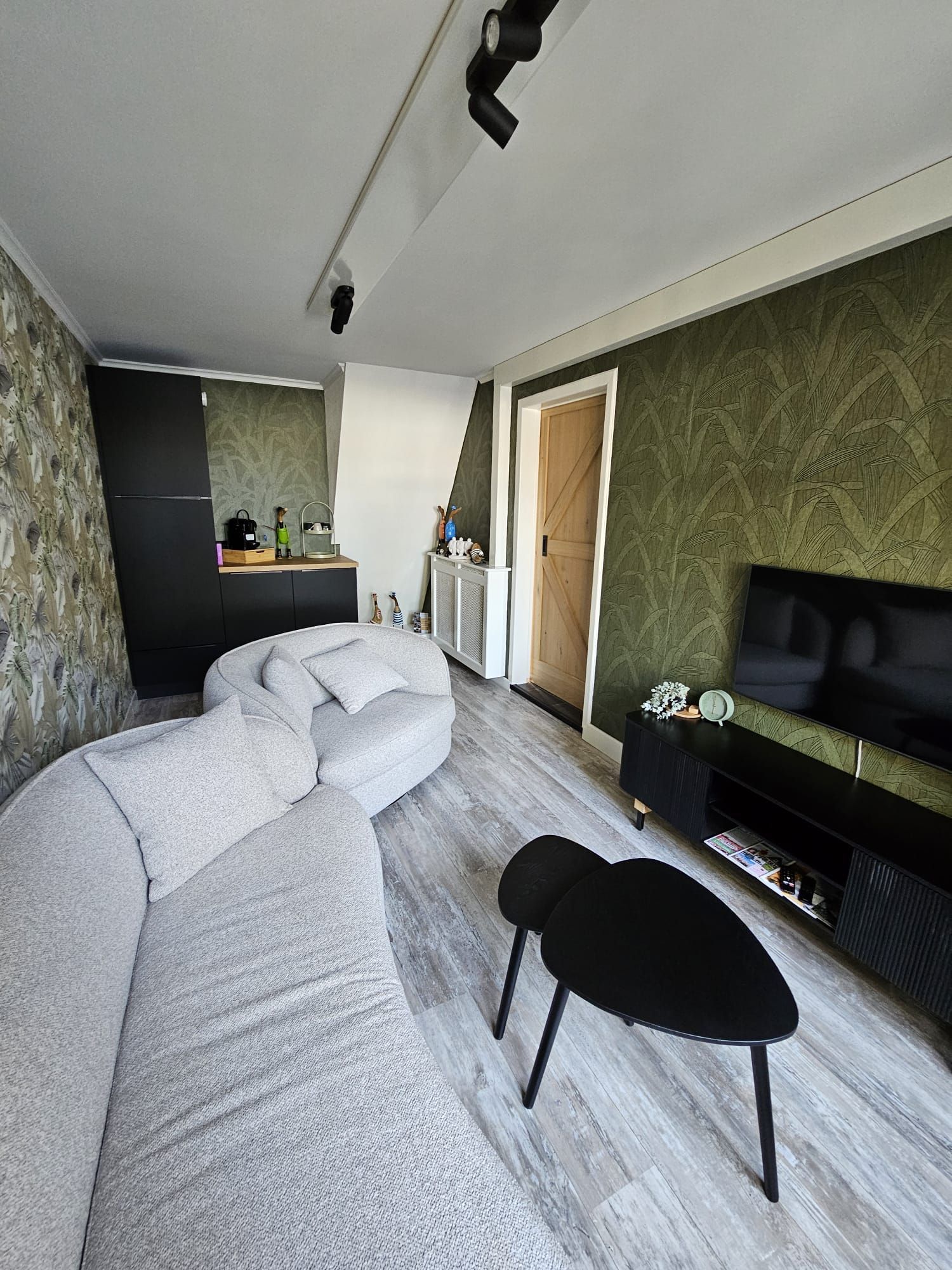 De woonkamer van Vakantiehuis Akkerzicht Oudesluis.