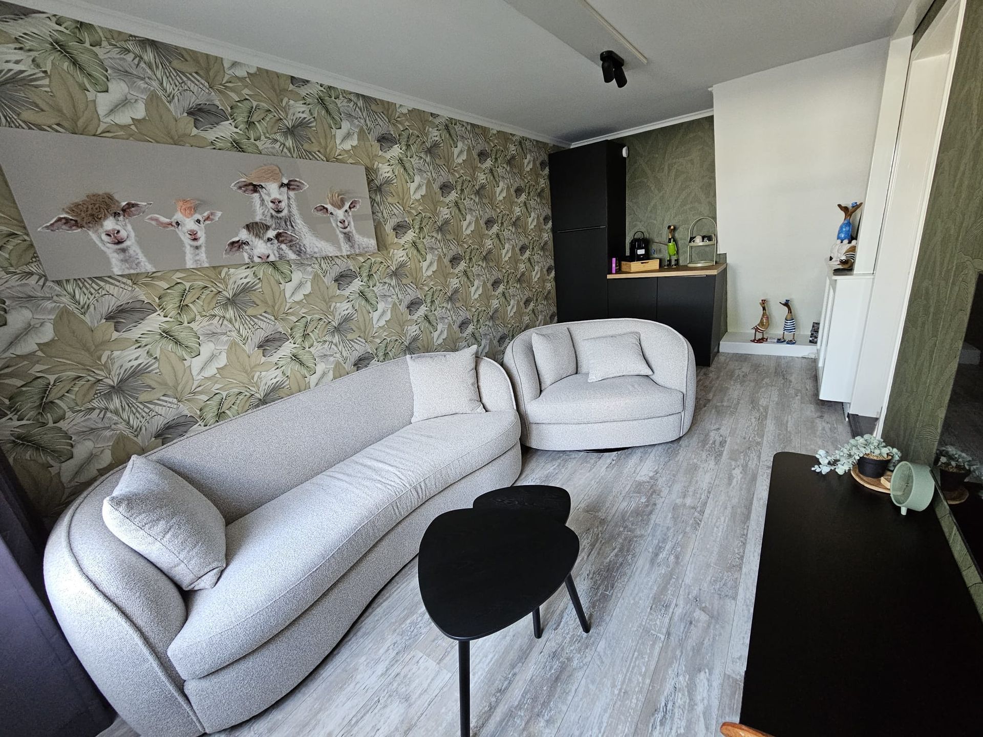 De woonkamer van Vakantiehuis Akkerzicht Oudesluis.