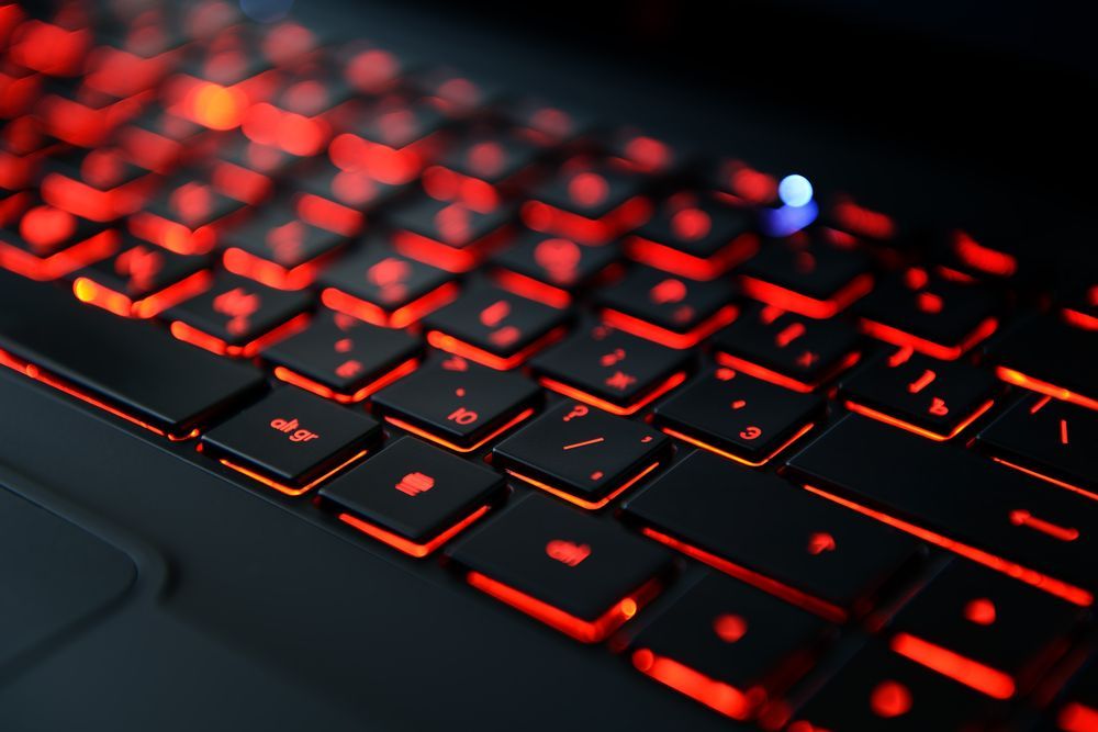 A Close Up of a Laptop Keyboard With Red Keys — Coastal Computing Solutions in Harrington, NSW