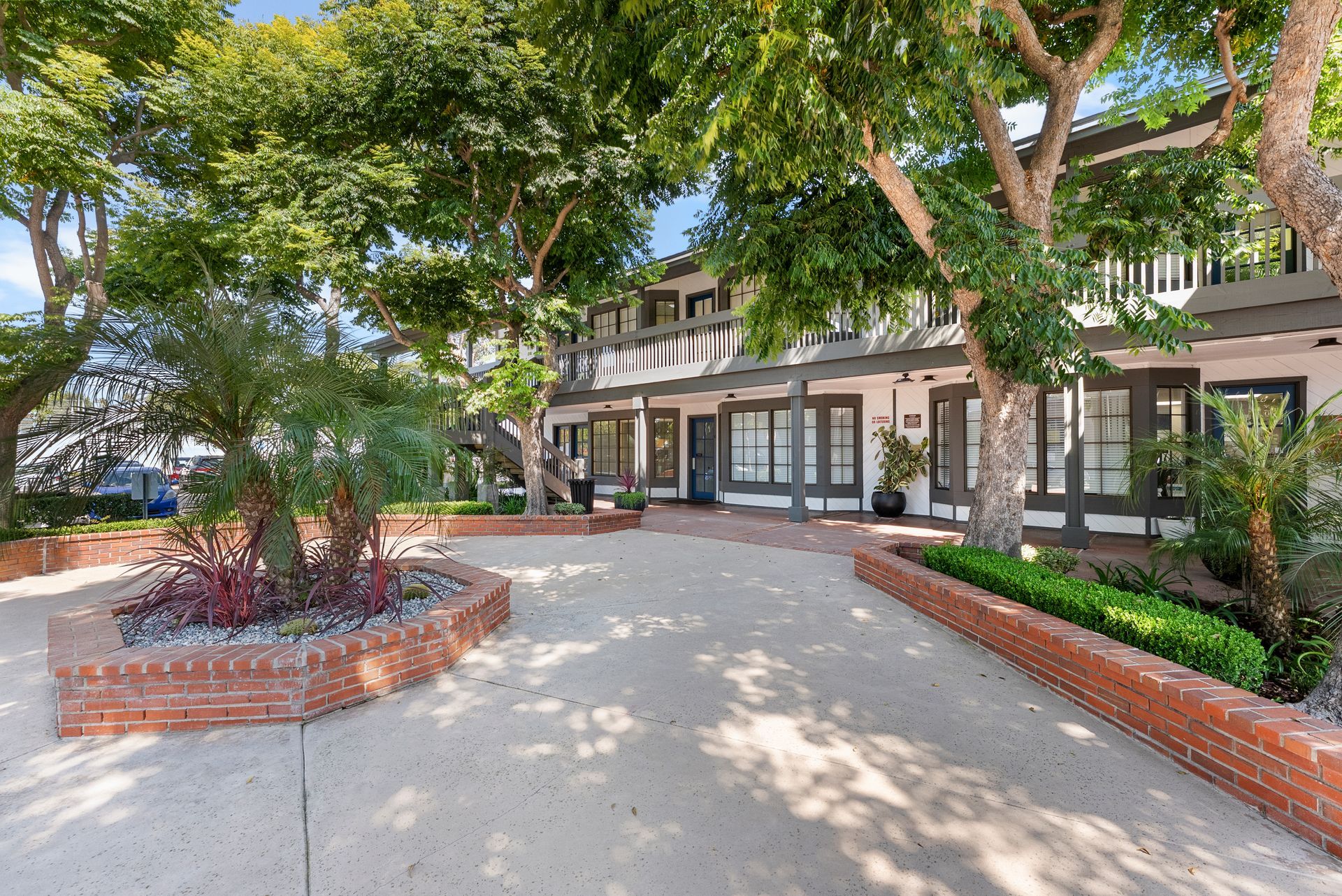 Courtyard currounded by offices and trees