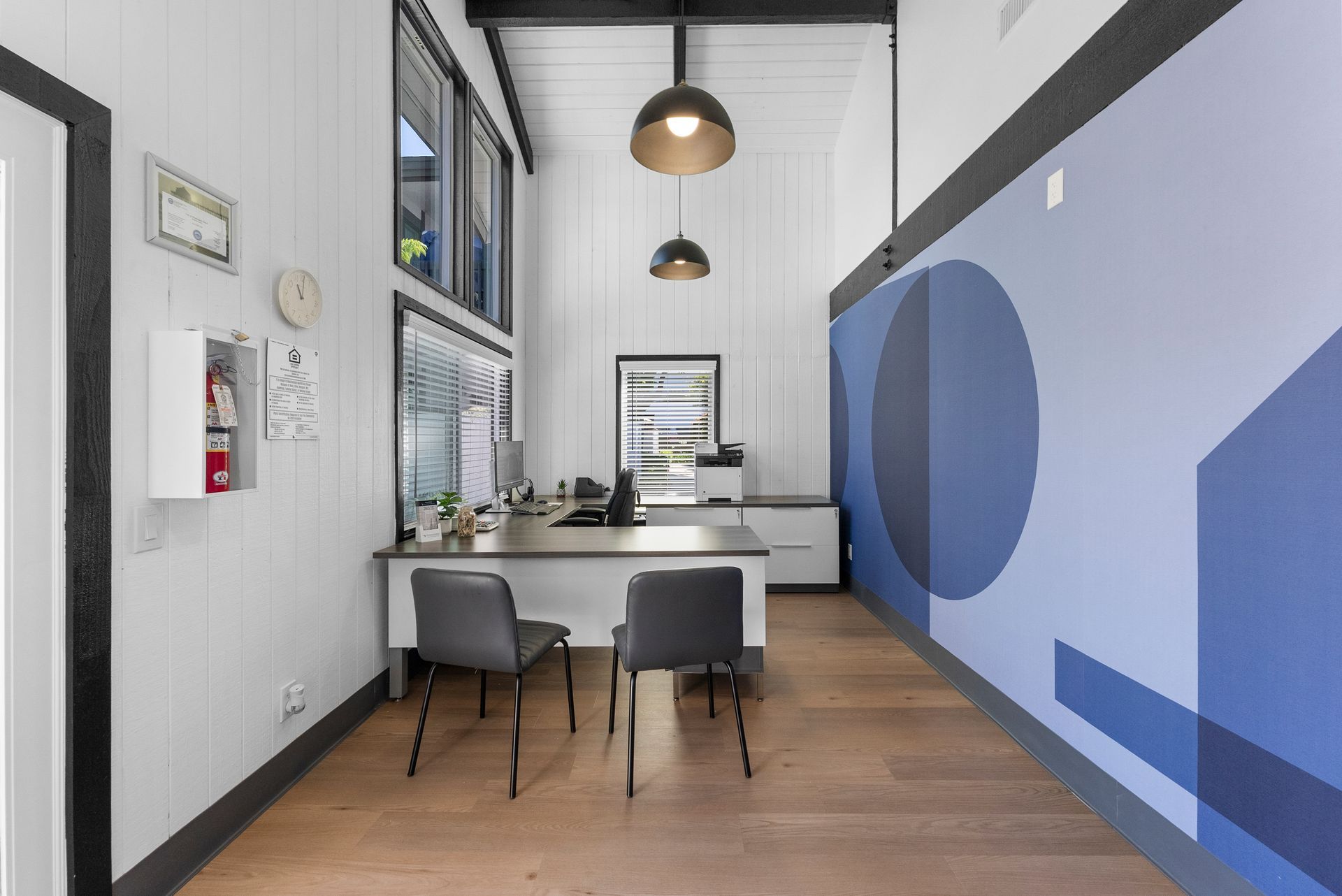 Office with desk and chairs