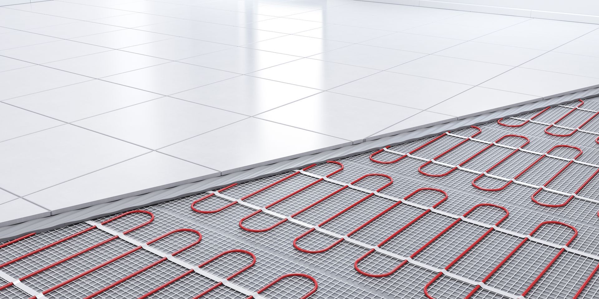 Underfloor Heating System with Red Pipes on A Gray Mat — Illawarra Underfloor Heating In Bellambi, NSW