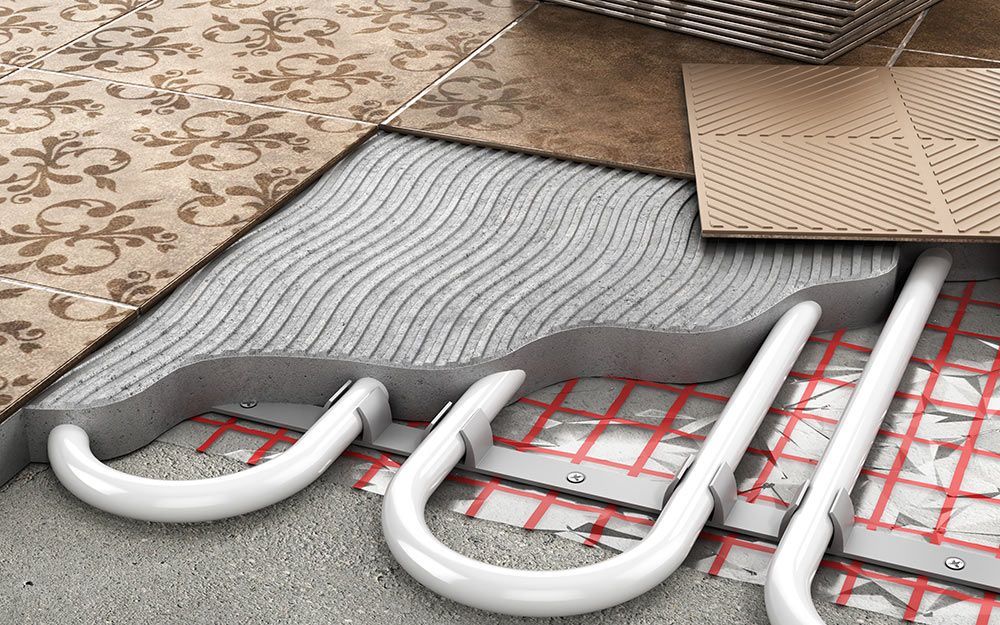 A Close up Of a Underfloor Heating System on A Tiled Floor — Illawarra Underfloor Heating In Bellambi, NSW