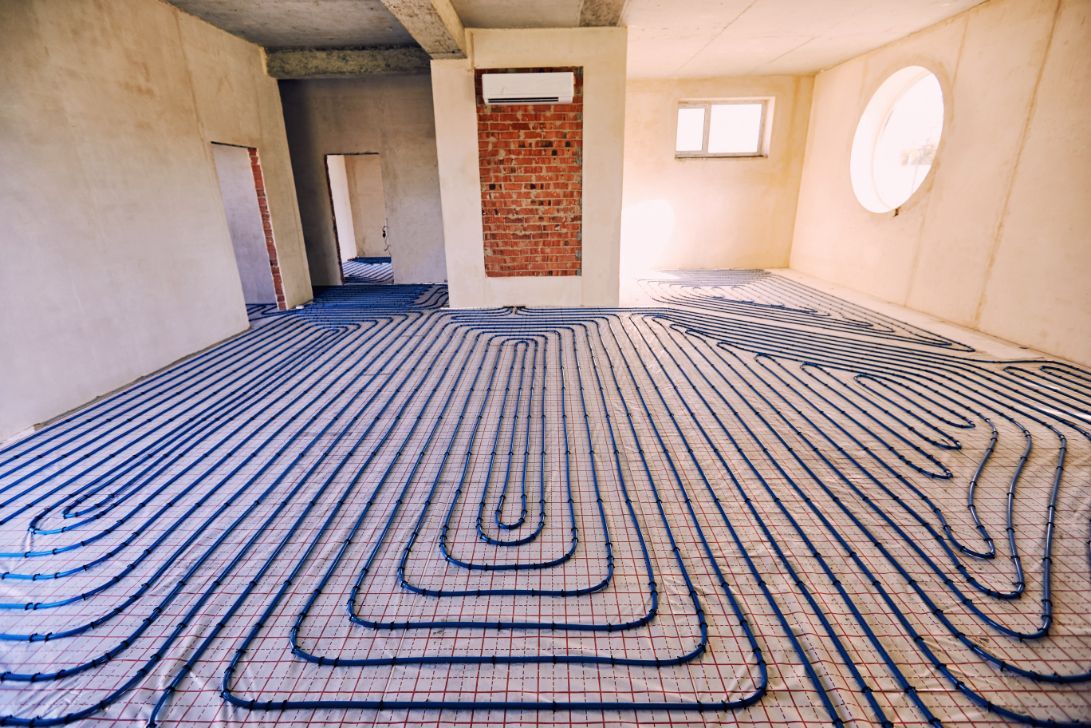 Blue Radiant Floor Heating Pipes Installed in A Room — Illawarra Underfloor Heating In Southern Highlands, NSW