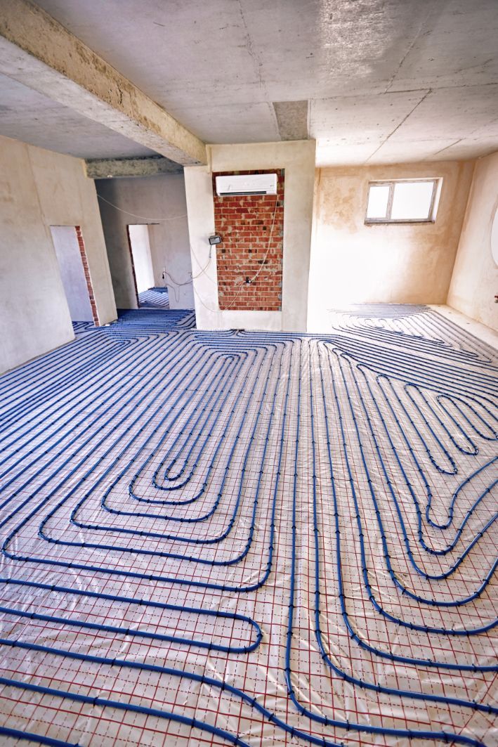 Blue Tubing Laid out On a Floor — Illawarra Underfloor Heating In Southern Highlands, NSW