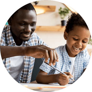 parent helping child learn with pencil and paper