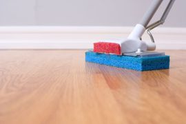 One of our professional cleaners in Honolulu, HI mopping a floor