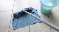 A ceramic floor is being cleaned by one of our professional cleaners in Honolulu, HI