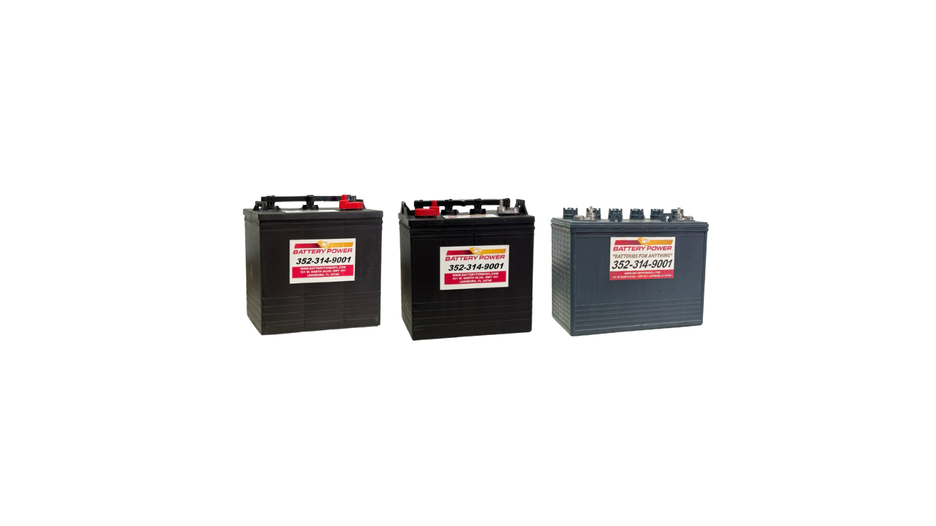Three black rectangular batteries with red and white terminals on a white background.