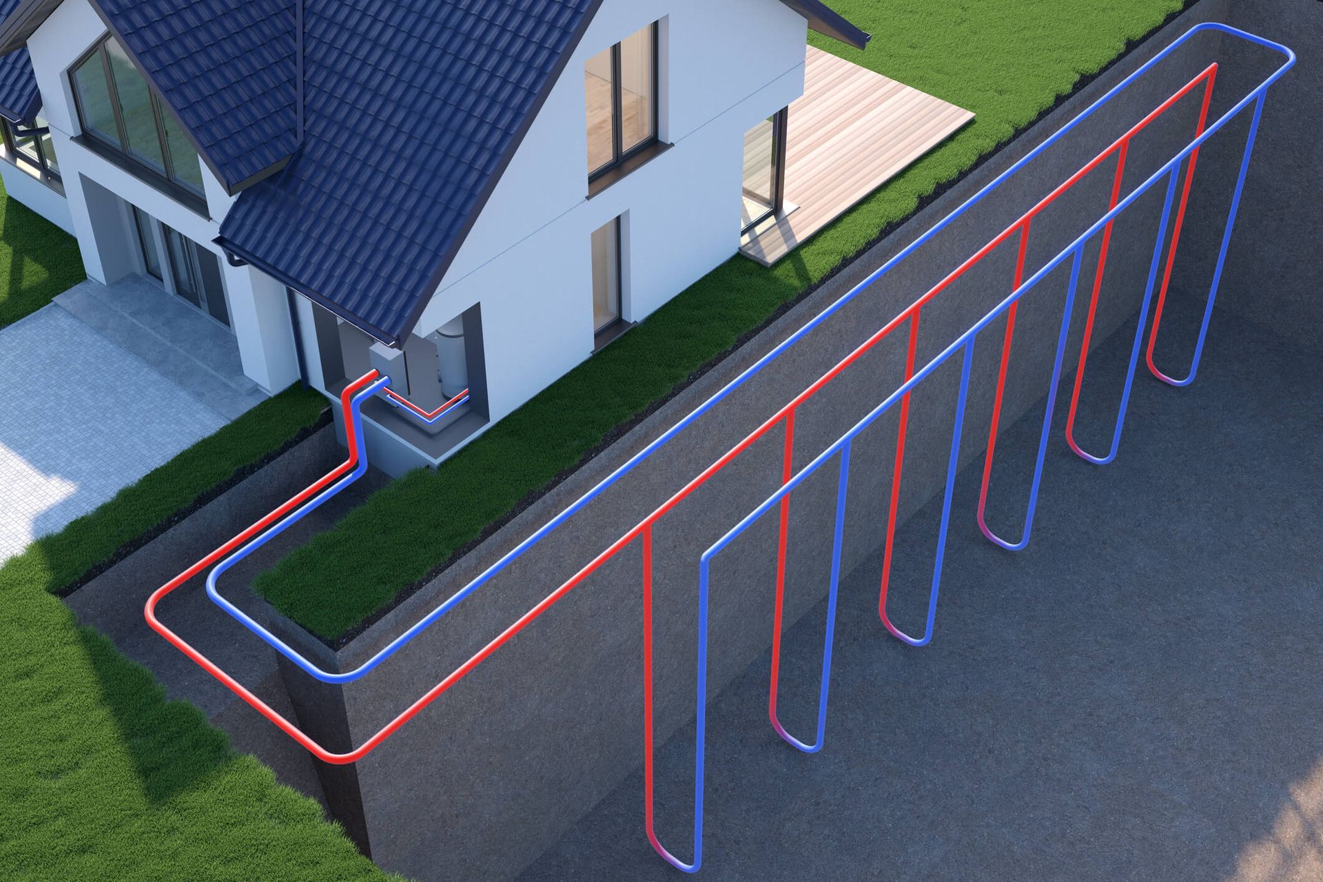 An aerial view of a house with many pipes coming out of it for a geothermal system.